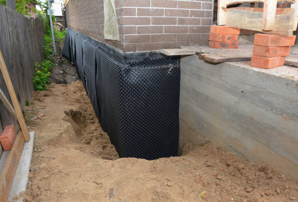 SJ Waterproofing Pros technician performing targeted Exterior Waterproofing assessment in Caledonia, OH